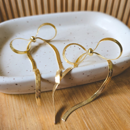 Bow gold earrings