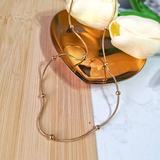 Round bead gold snake necklace